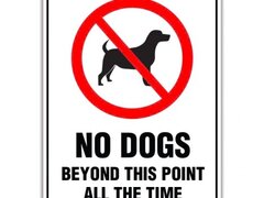 NO DOGS BEYOND THIS POINT ALL THE TIME SIGN